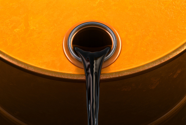 Imagem de um barril com petróleo sendo despejado em referência à Guerra do Yom Kippur.